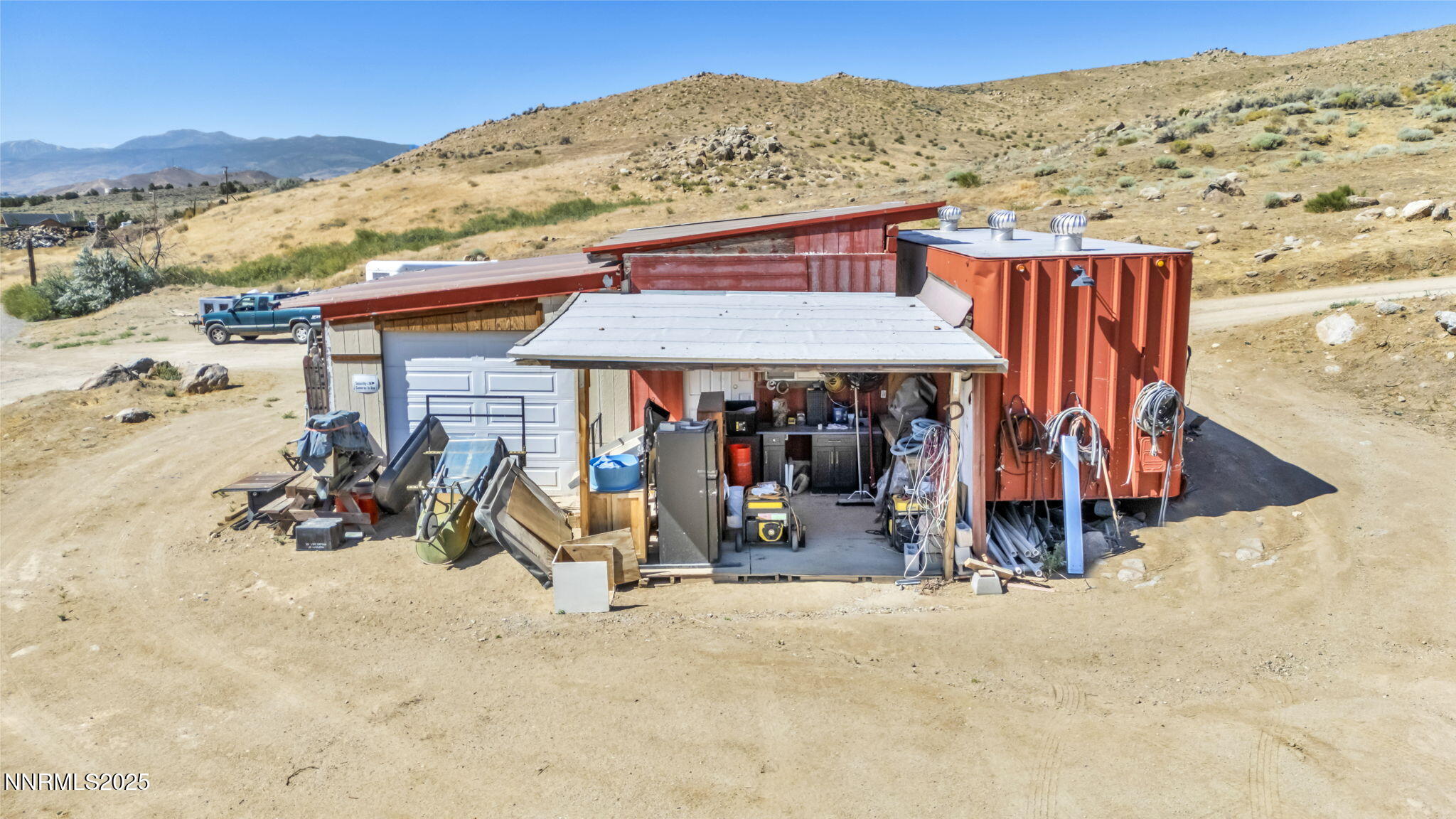 8560 Chimney Road, Unit GOOGLE MAPS IS NOT ACCURATE Sparks, NV 89436 - Photo 25 of 46 an outdoor space with patio