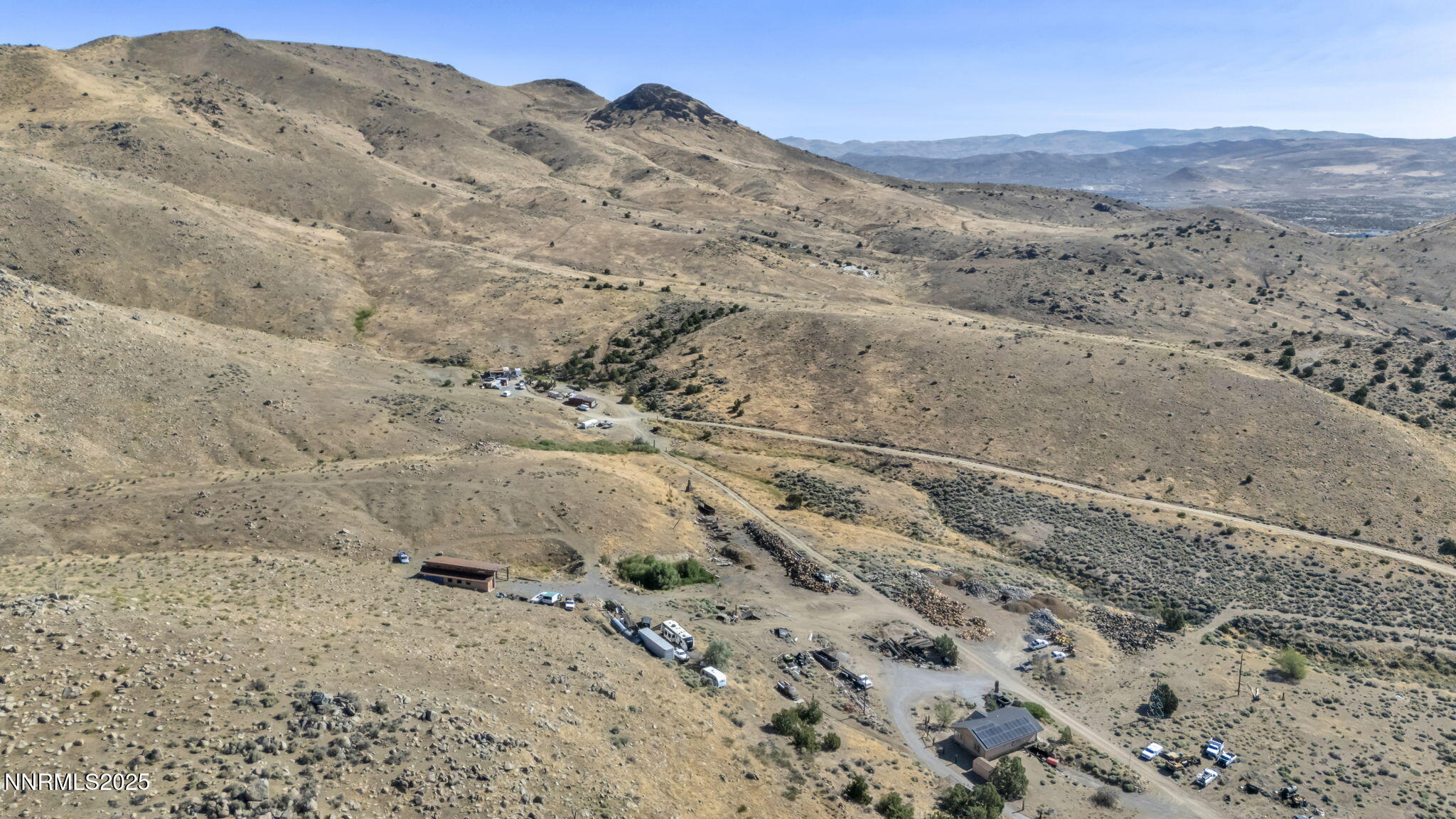 8560 Chimney Road, Unit GOOGLE MAPS IS NOT ACCURATE Sparks, NV 89436 - Photo 3 of 46 a view of a dry yard