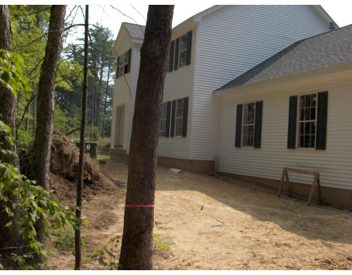 5 Groton-Shirley Road Ayer, MA 01432 - Photo 6 of 7 a view of a house with a yard