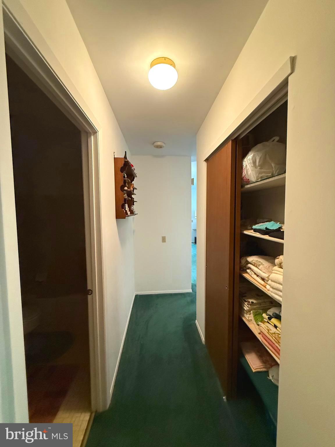 16A Spring Street Manchester Township, NJ 08759 - Photo 13 of 20 a view of hallway with stairs and furniture