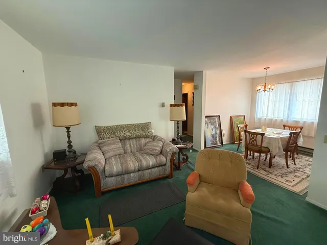 a living room with furniture and a couch