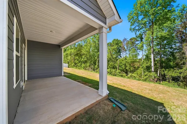 a view of backyard with green space