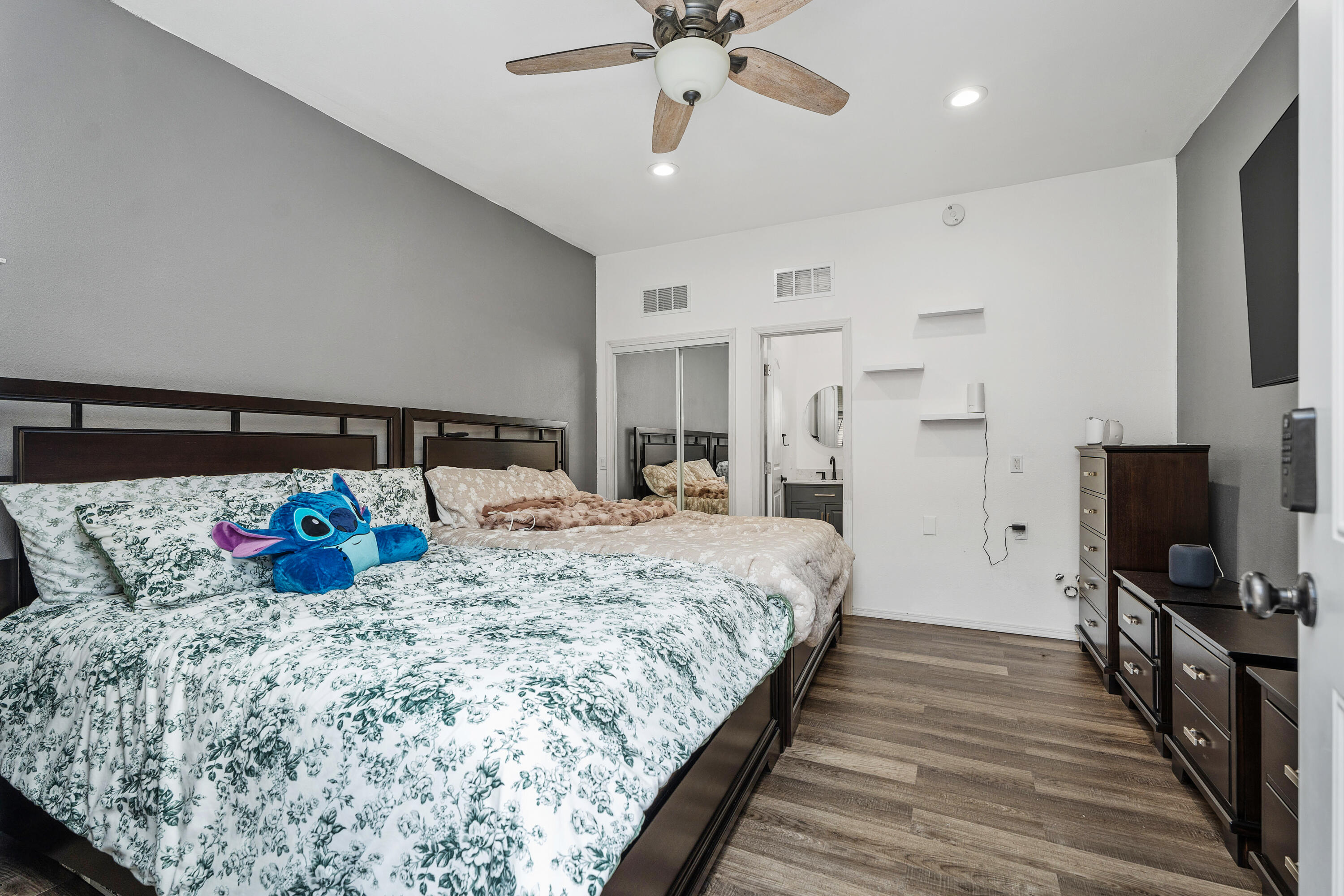 83814 Wolf Creek Road Indio, CA 92203 - Photo 23 of 28 a bedroom with bed and flat tv screen