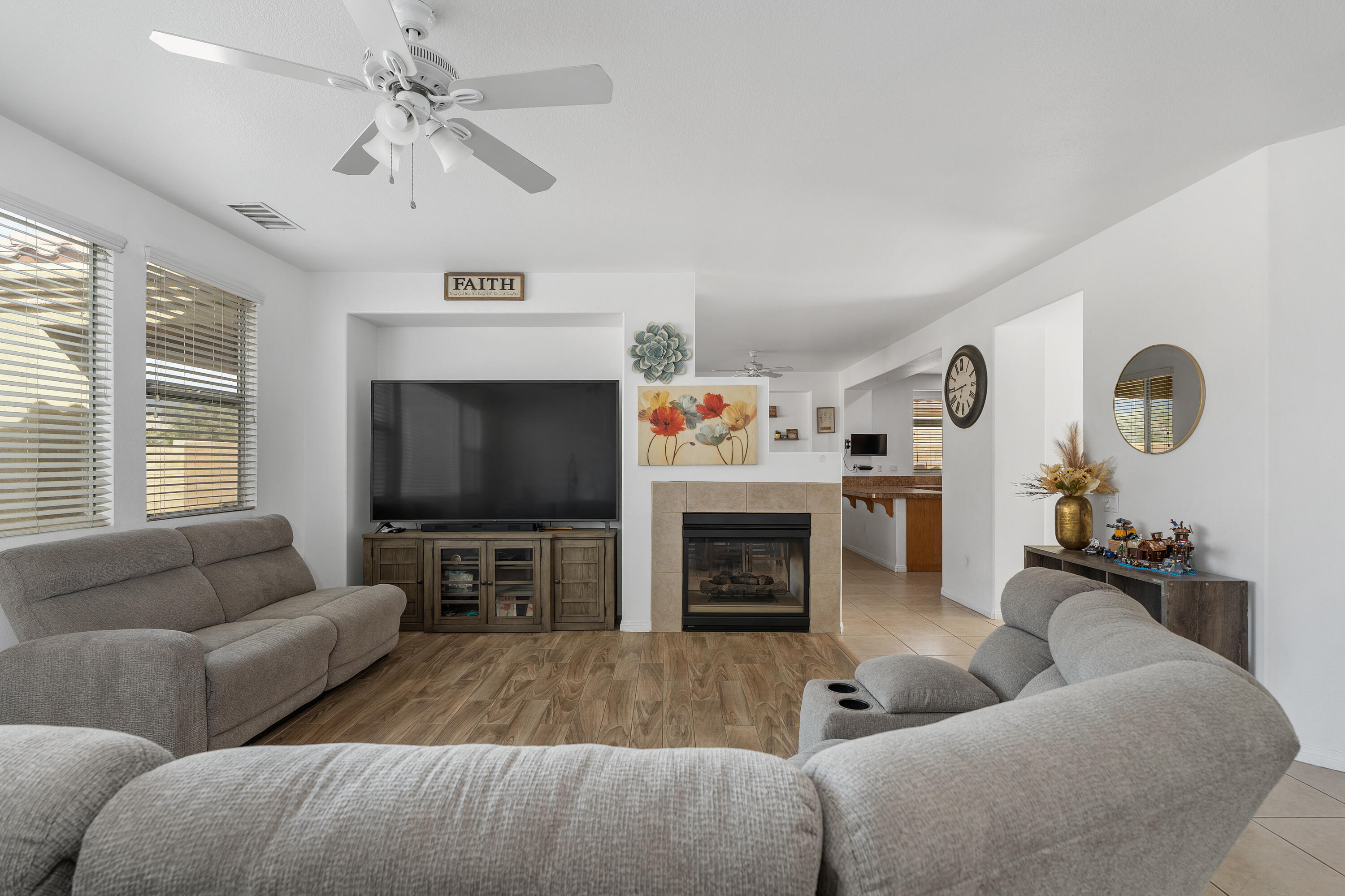 83814 Wolf Creek Road Indio, CA 92203 - Photo 8 of 28 a living room with furniture and a flat screen tv