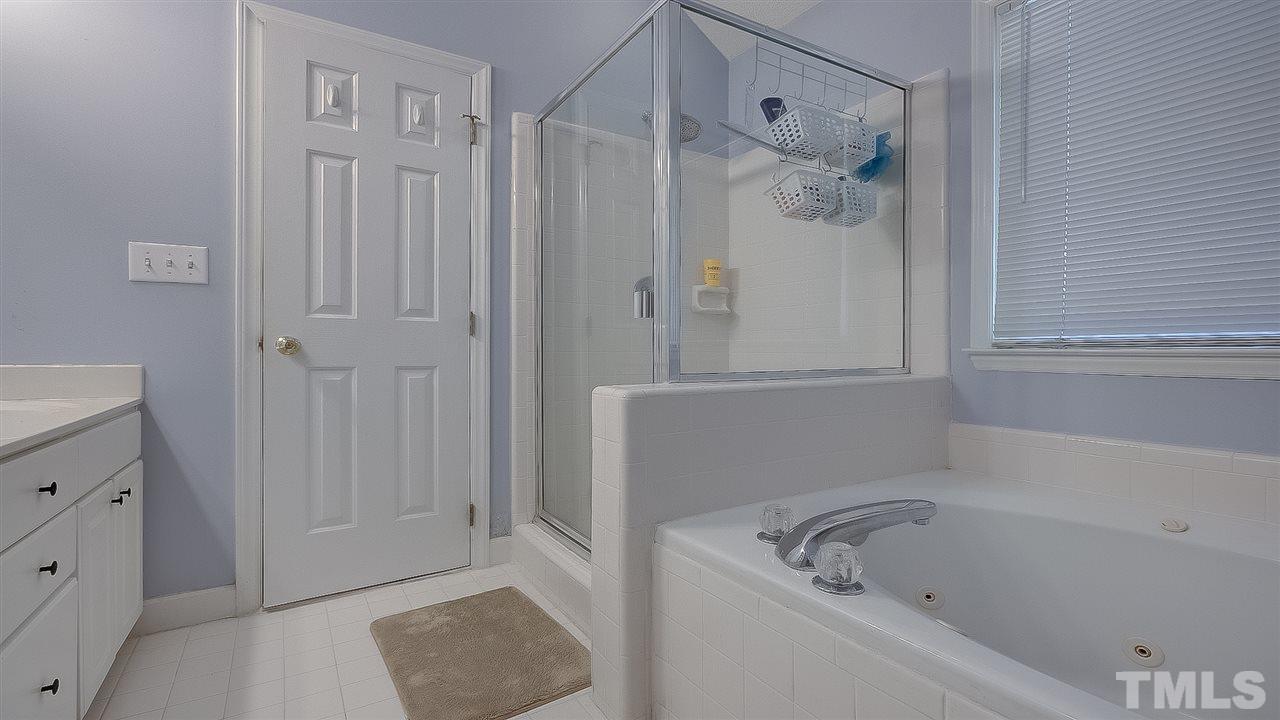 2041 Muirfield Village Way Raleigh, NC 27604 - Photo 11 of 25 Separate tub & shower in master bath!