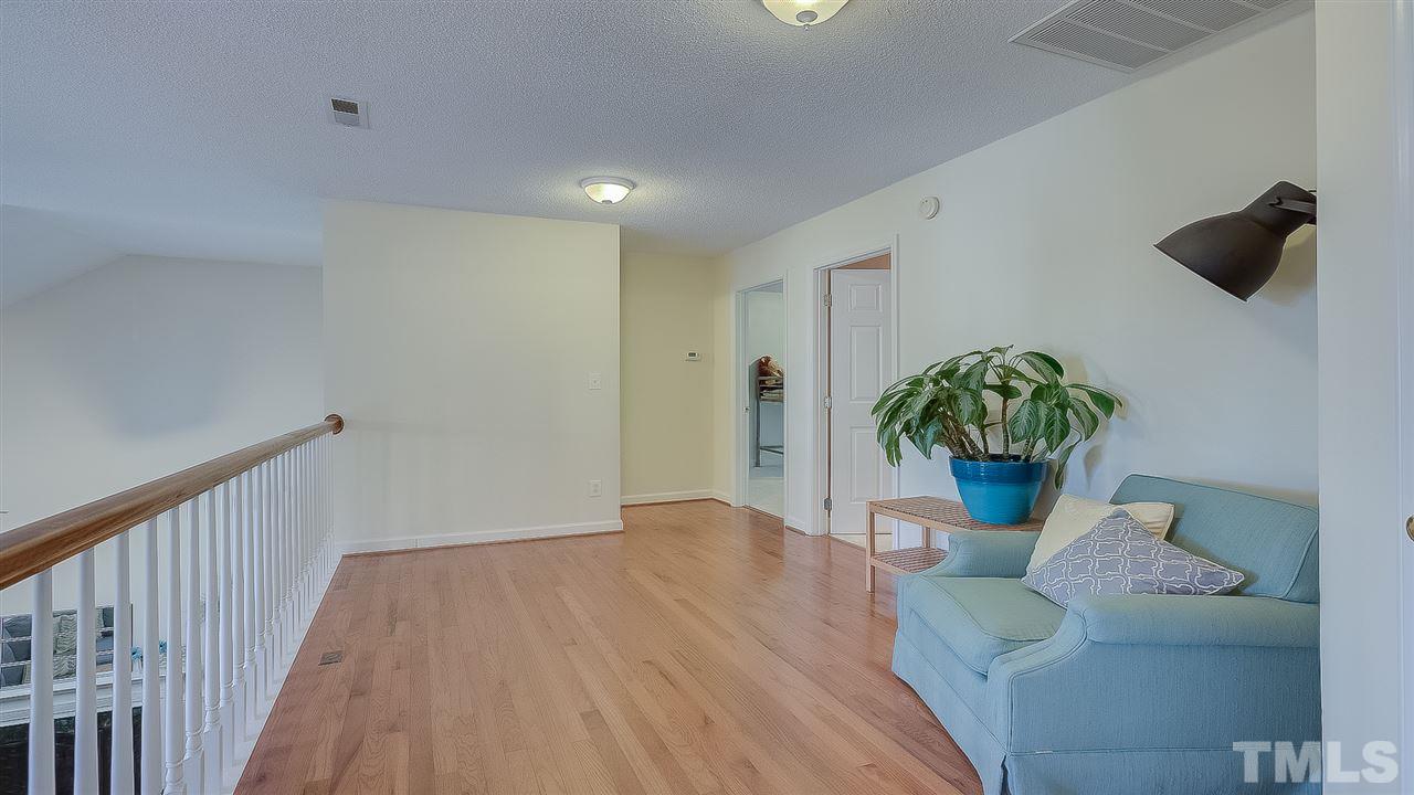 2041 Muirfield Village Way Raleigh, NC 27604 - Photo 12 of 25 2nd floor loft space overlooking living room