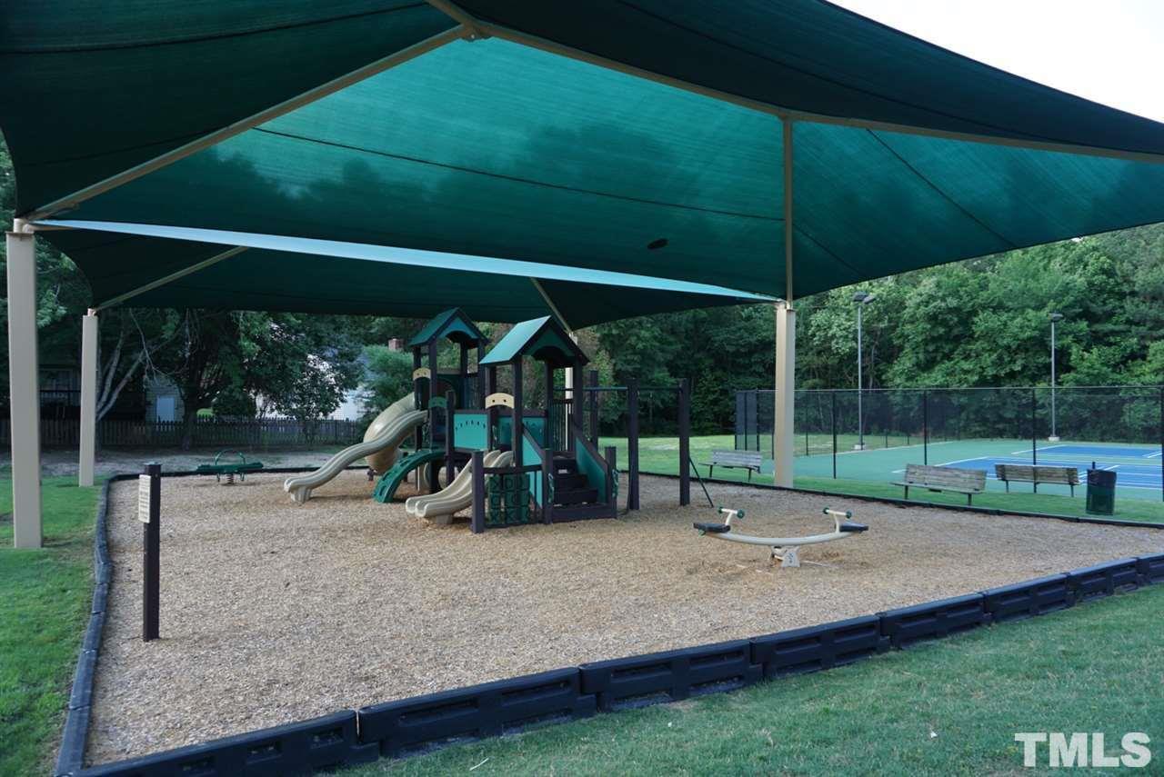 2041 Muirfield Village Way Raleigh, NC 27604 - Photo 22 of 25 1 of 2 neighborhood playgrounds... with shade!