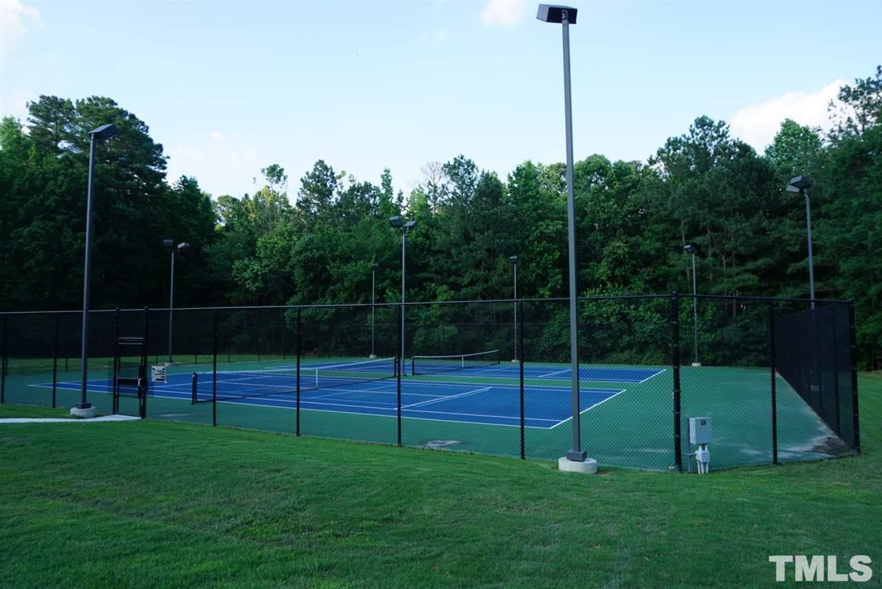 2041 Muirfield Village Way Raleigh, NC 27604 - Photo 24 of 25 Beautiful tennis courts with LED lighting for night matches!