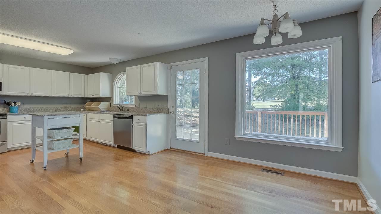 2041 Muirfield Village Way Raleigh, NC 27604 - Photo 7 of 25 Enjoy the views from your eat-in kitchen.