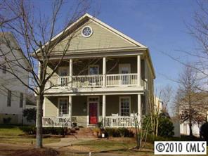 a front view of a house with parking