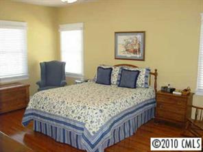 353 Elis Way Fort Mill, SC 29708 - Photo 5 of 6 a bedroom with a bed and dresser with window