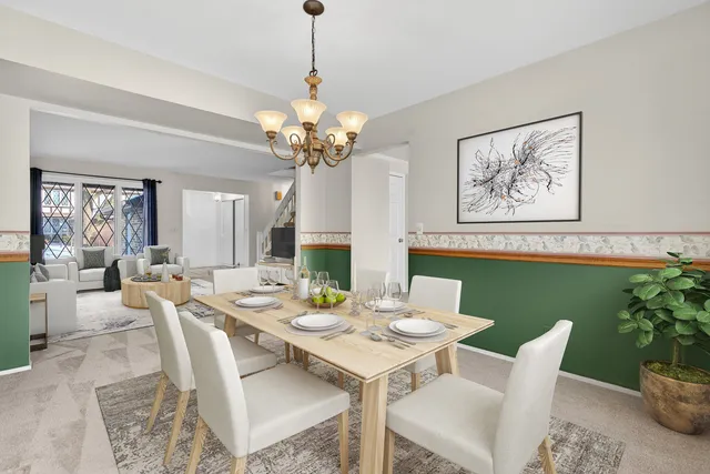 a view of an empty room with a fireplace and a window