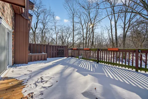 a view of a brick building with many windows