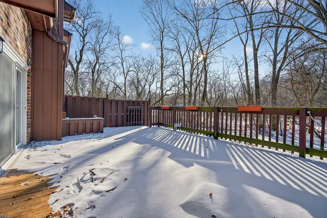 a view of a brick building with many windows