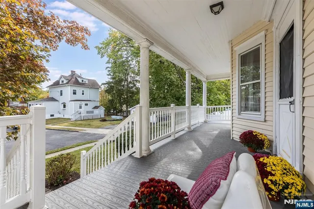 a view of balcony with furniture