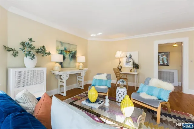 a living room with furniture and a table