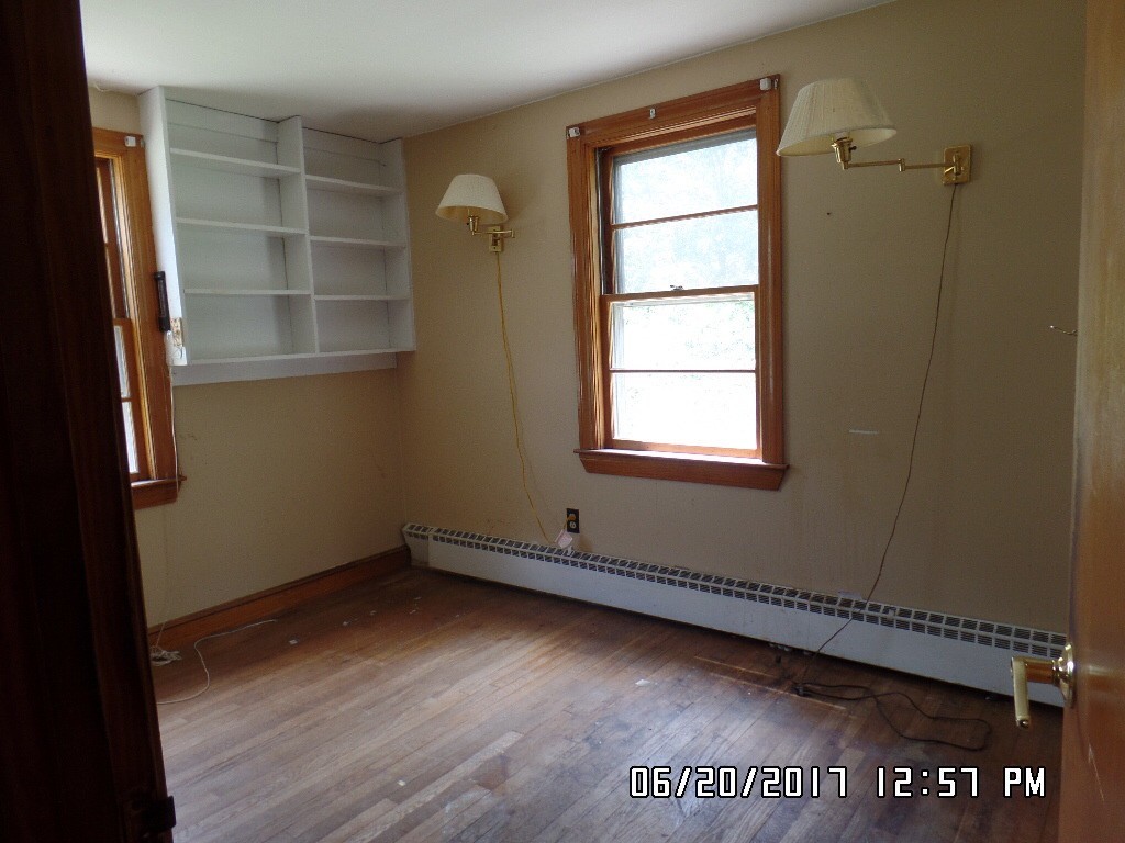58 Baldwin Road Billerica, MA 01821 - Photo 11 of 15 wooden floor in an empty room