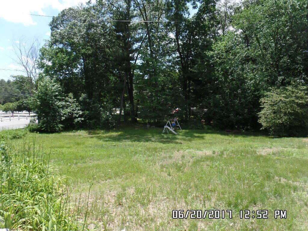58 Baldwin Road Billerica, MA 01821 - Photo 3 of 15 a view of outdoor space with deck and yard