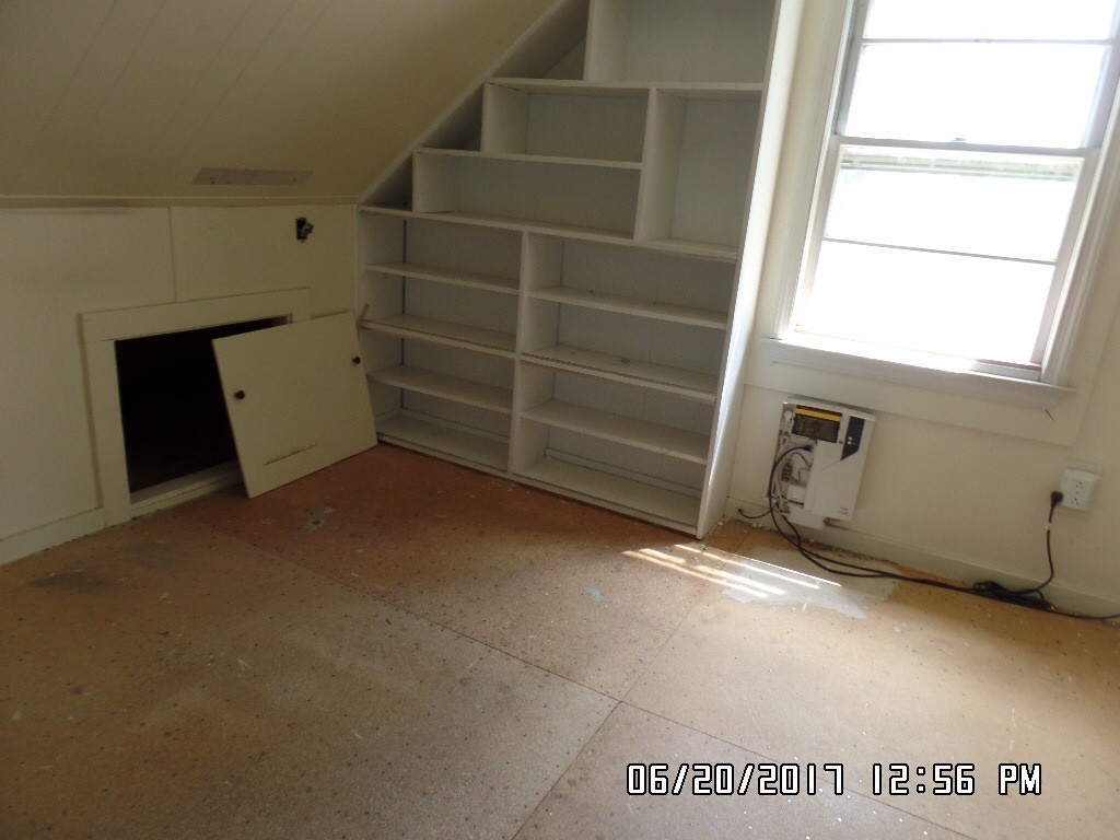 58 Baldwin Road Billerica, MA 01821 - Photo 7 of 15 a view of an empty room and a window