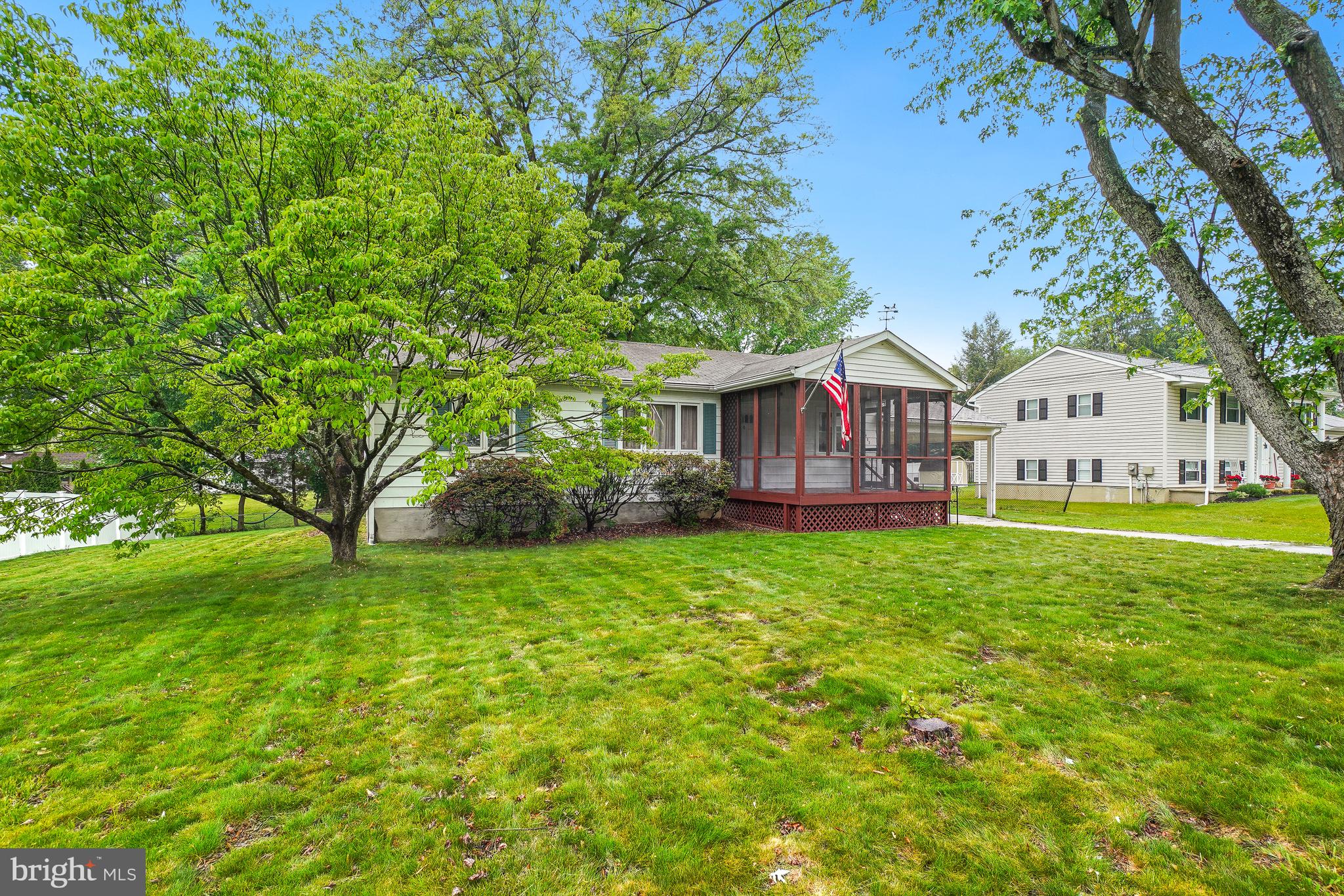 a view of a house with a big yard