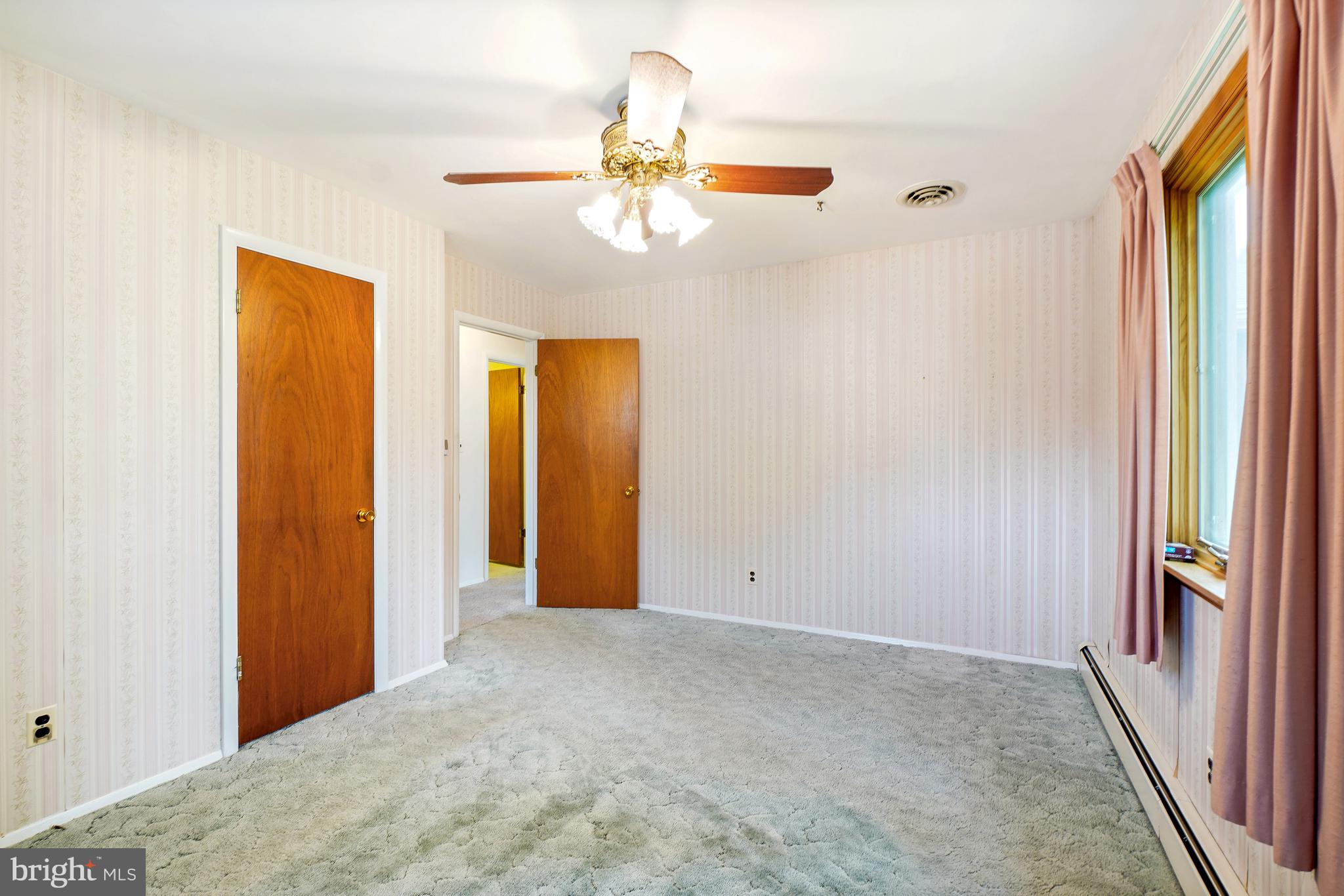 1403 Disney Road Severn, MD 21144 - Photo 19 of 39 a view of a livingroom with a chandelier