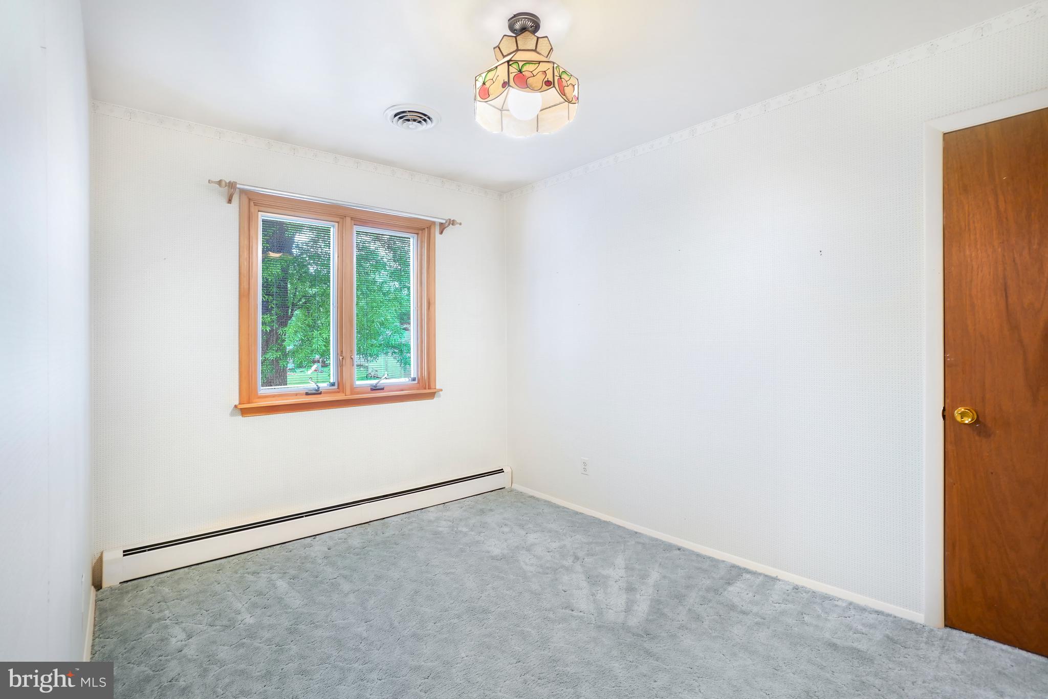 1403 Disney Road Severn, MD 21144 - Photo 20 of 39 an empty room with a window