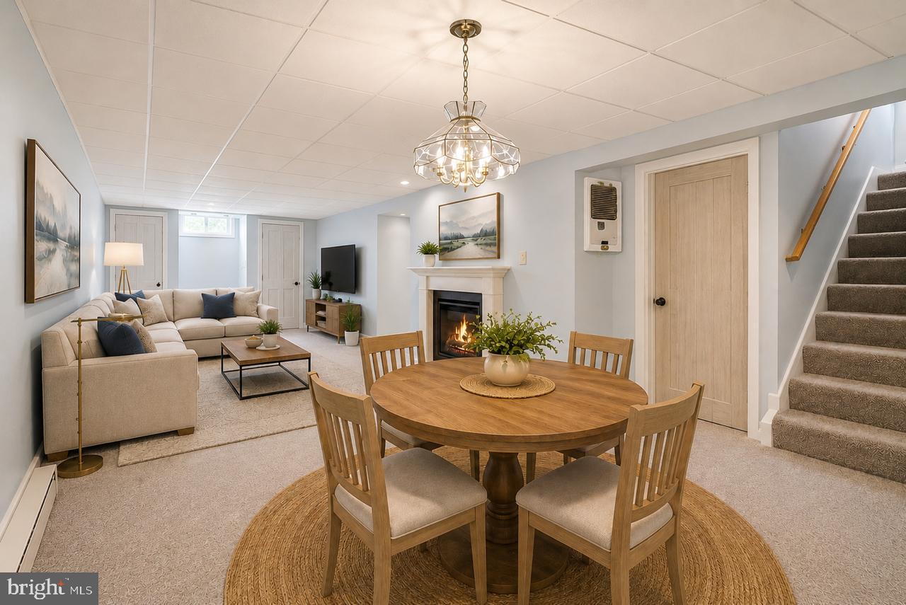 1403 Disney Road Severn, MD 21144 - Photo 28 of 39 a view of a dining room with furniture