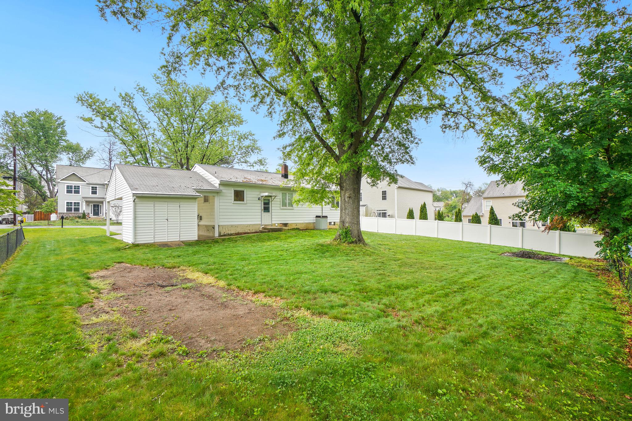1403 Disney Road Severn, MD 21144 - Photo 35 of 39 a view of a house with backyard and a tree