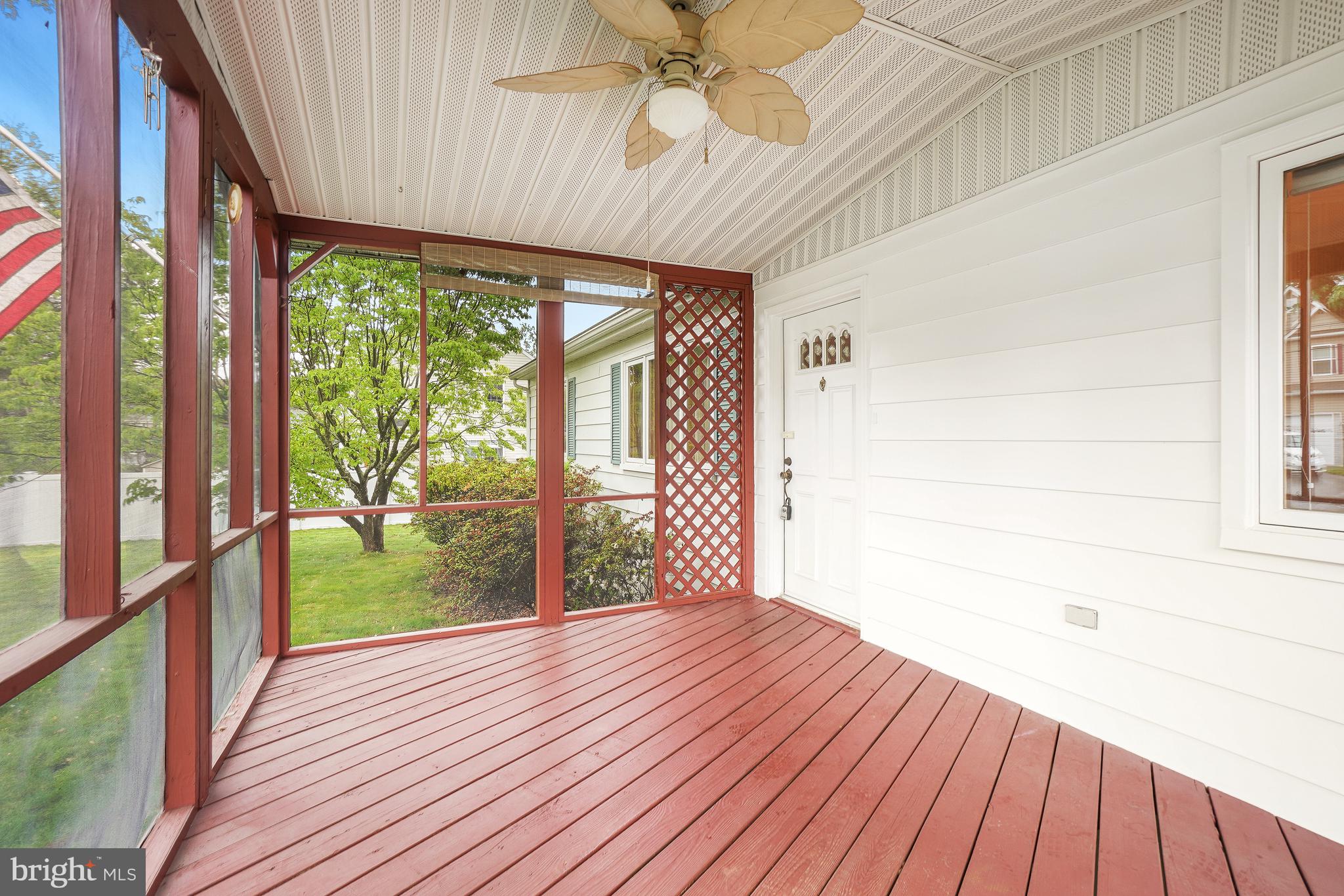 1403 Disney Road Severn, MD 21144 - Photo 5 of 39 a view of a room with wooden floor and balcony
