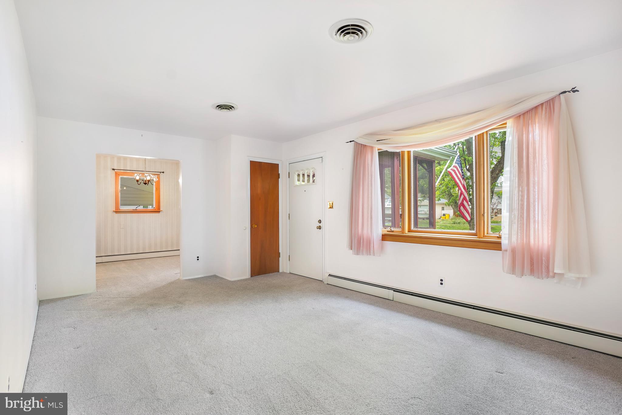 1403 Disney Road Severn, MD 21144 - Photo 6 of 39 a view of an empty room with a window