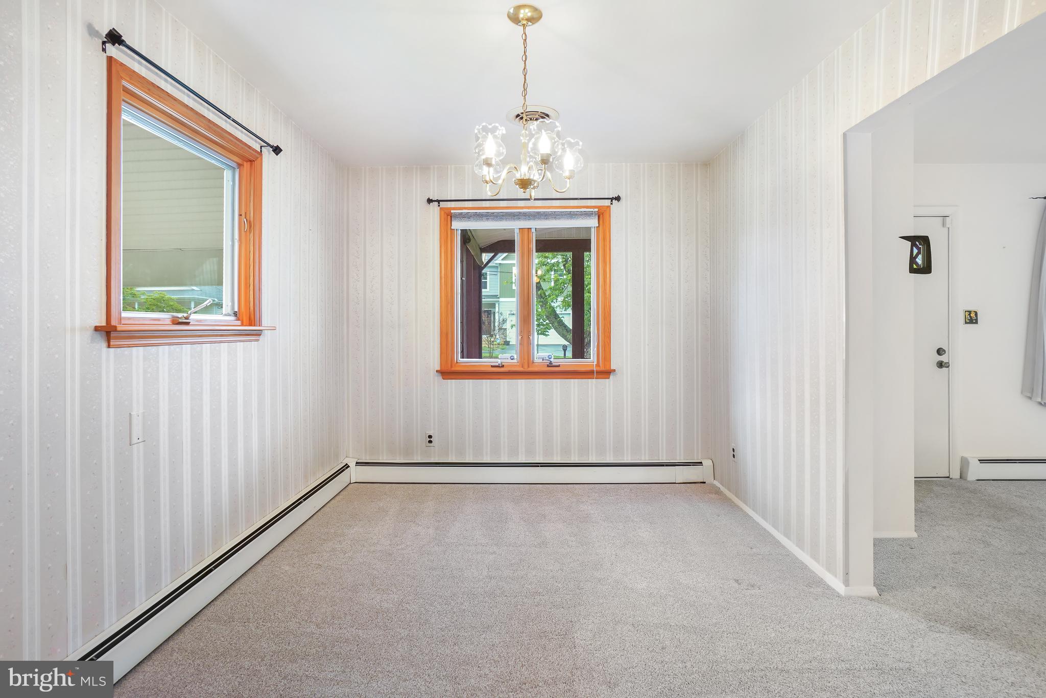 1403 Disney Road Severn, MD 21144 - Photo 9 of 39 a view of an empty room with a window