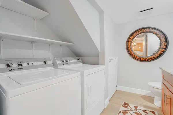 a utility room with dryer and washer