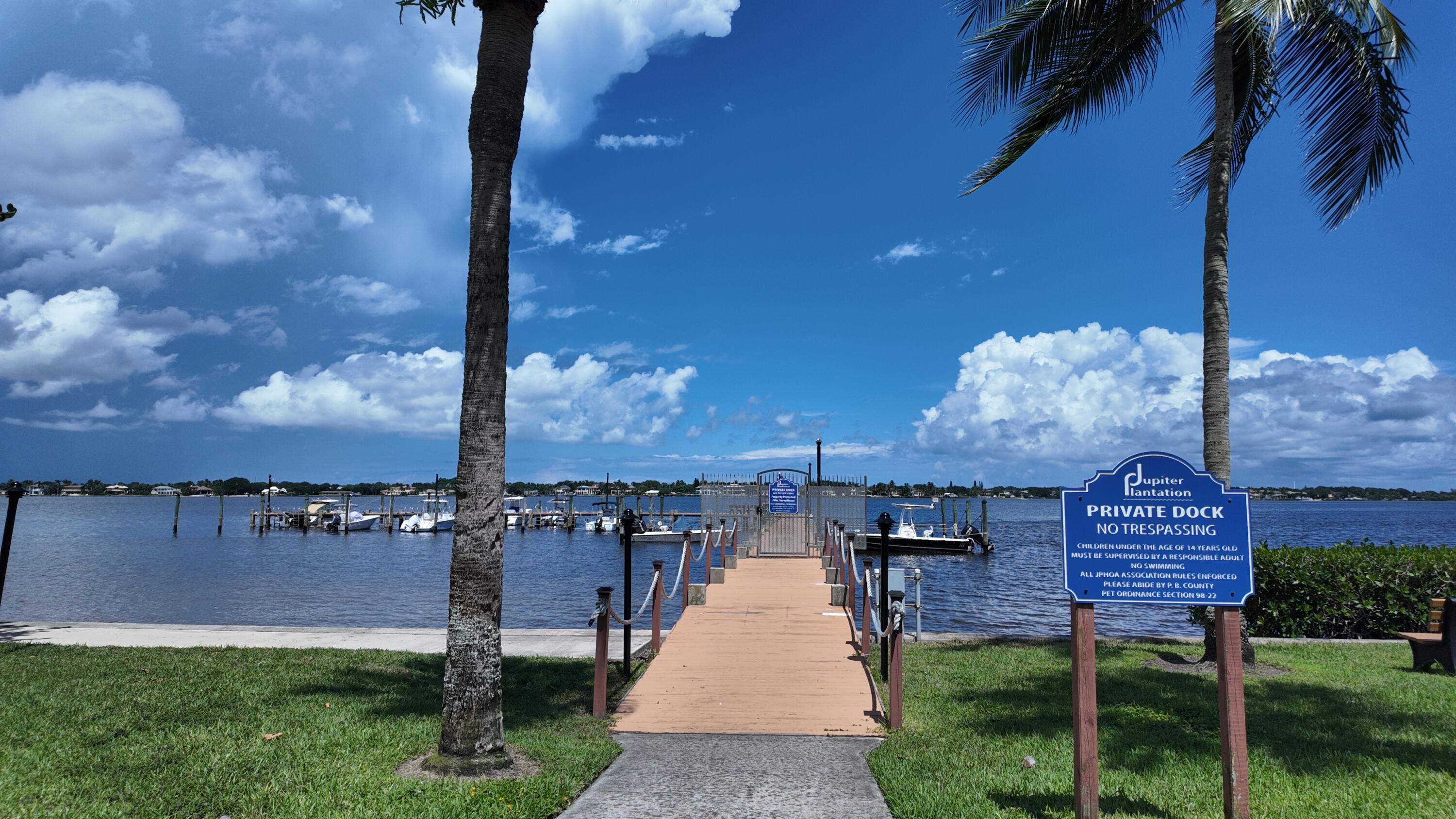 825 Center Street, Unit 14A Jupiter, FL 33458 - Photo 33 of 57 Dock entrance