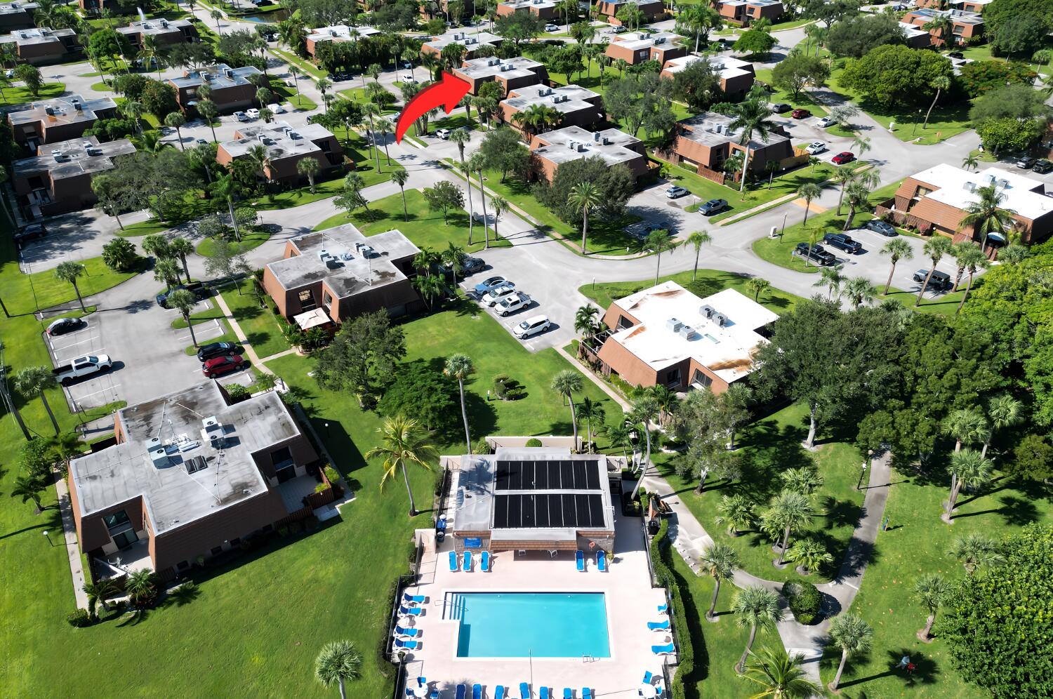 825 Center Street, Unit 14A Jupiter, FL 33458 - Photo 35 of 57 an aerial view of multiple houses with yard