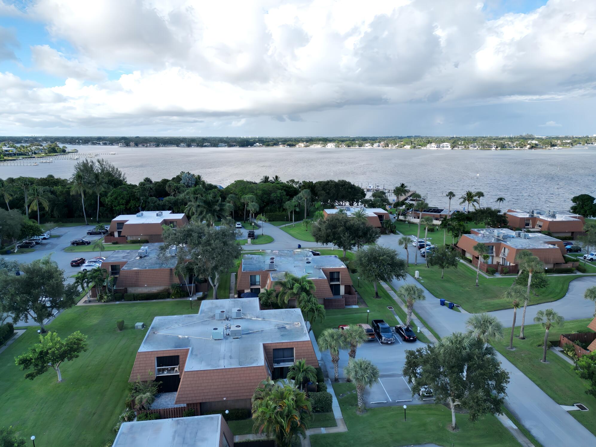 825 Center Street, Unit 14A Jupiter, FL 33458 - Photo 39 of 57 an aerial view of multiple house