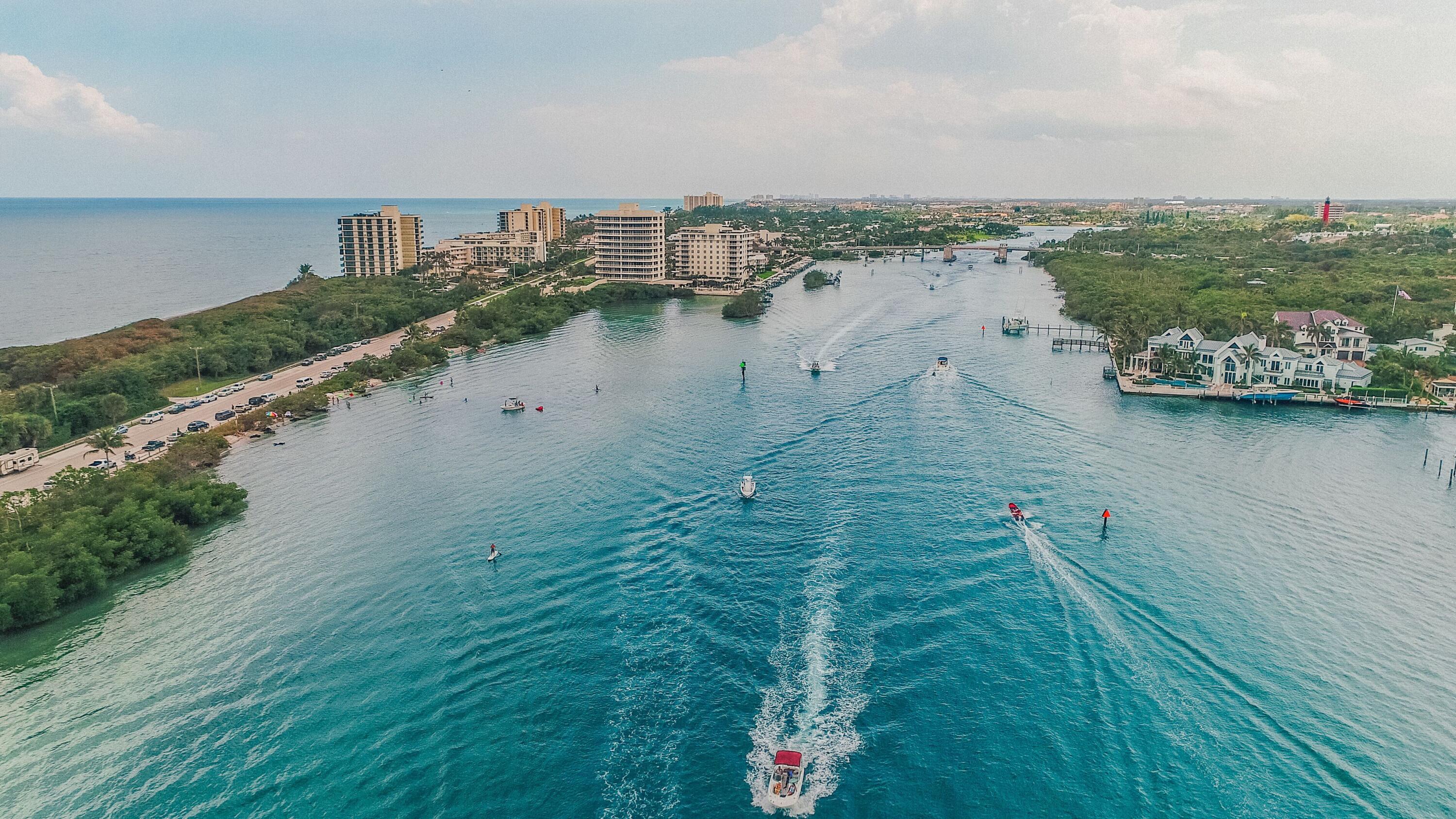 825 Center Street, Unit 14A Jupiter, FL 33458 - Photo 52 of 57 an aerial view of ocean with residential house with outdoor space