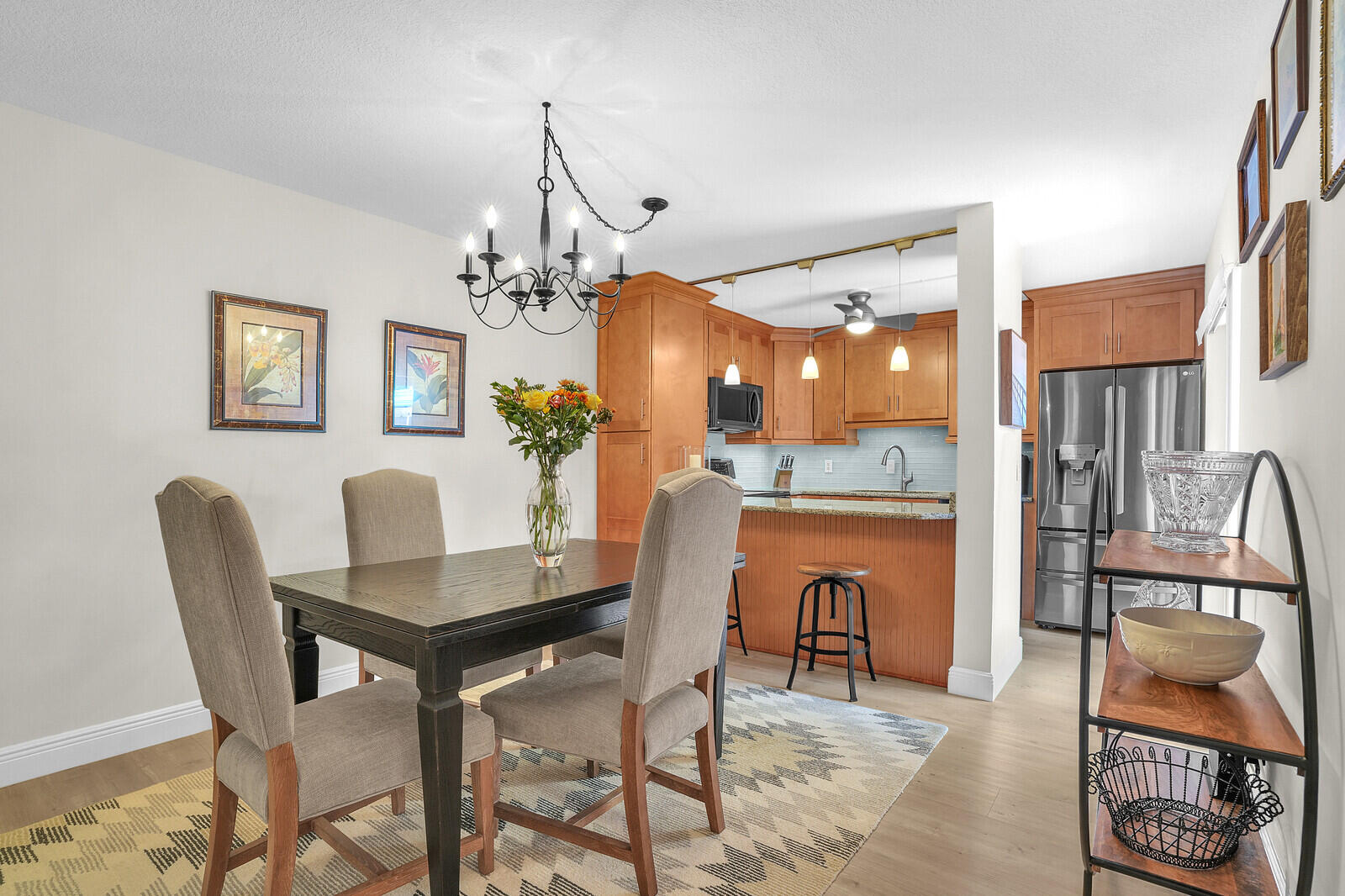 825 Center Street, Unit 14A Jupiter, FL 33458 - Photo 9 of 57 a dining room with furniture and window