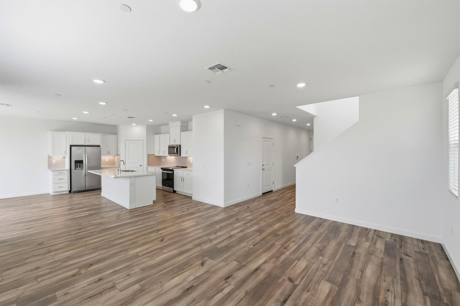 1270 Ribiolo Lane Mountain House, CA 95391 - Photo 3 of 13 a view of kitchen and kitchen with a sink