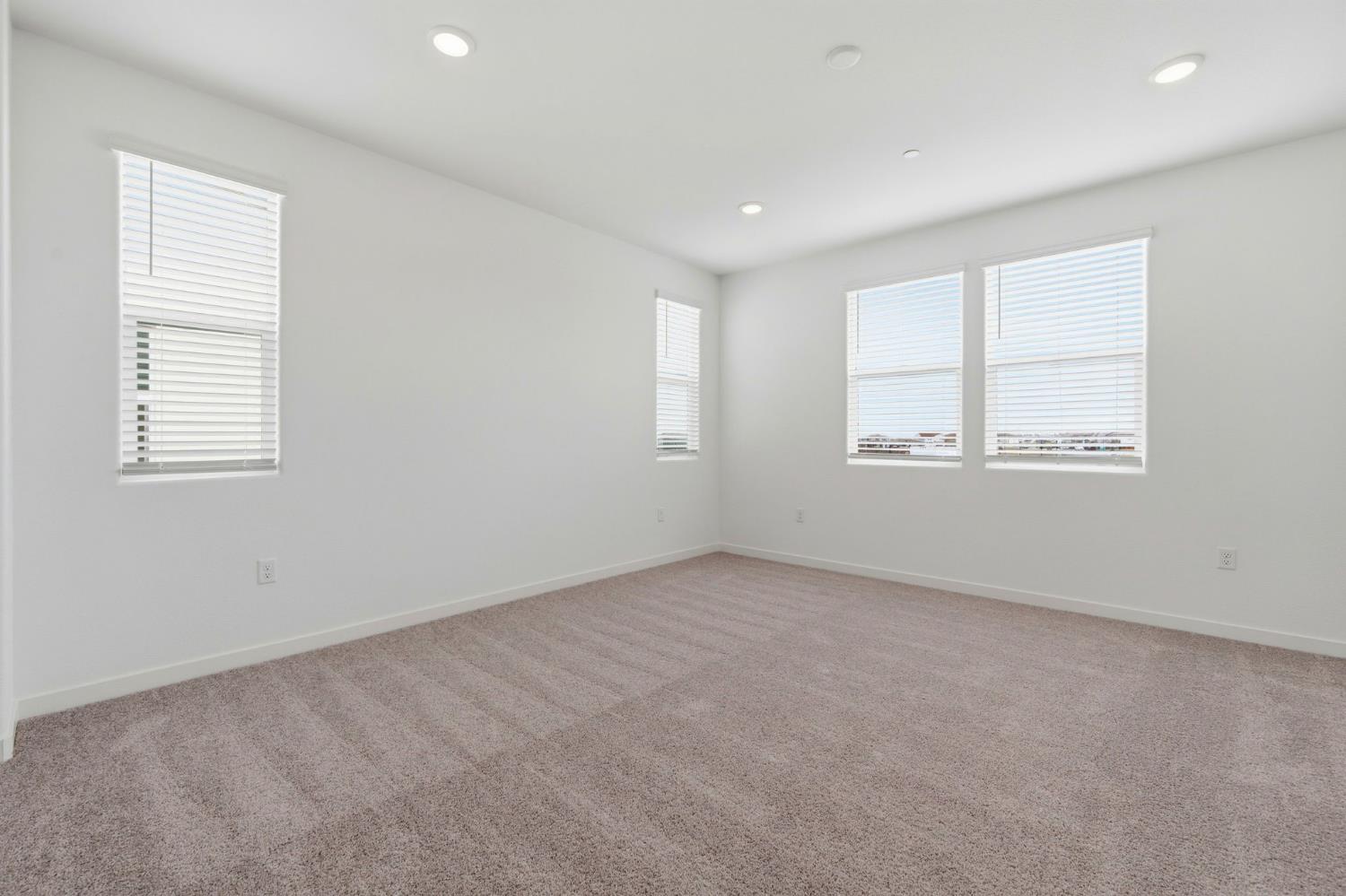 1270 Ribiolo Lane Mountain House, CA 95391 - Photo 7 of 13 an empty room with windows