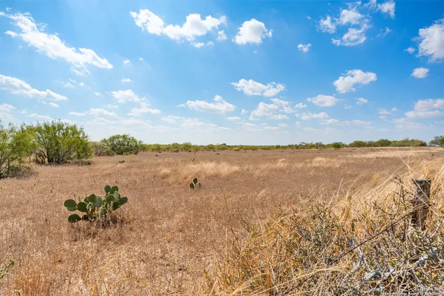 a view of lake with mountain in the background