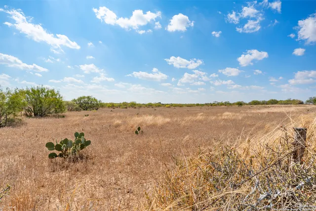 a view of lake with mountain in the background