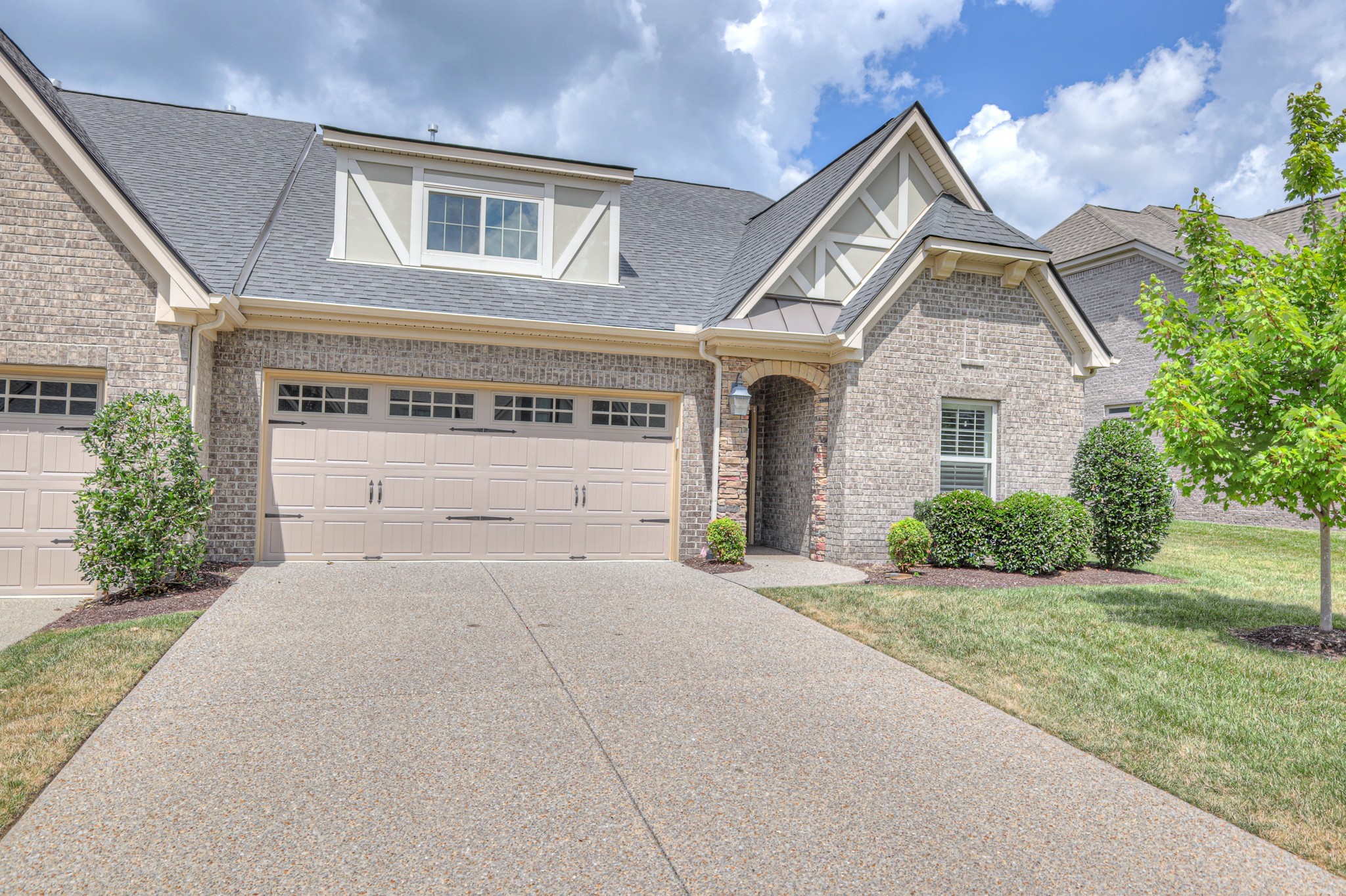 213 Vintage Way Lebanon, TN 37087 - Photo 1 of 33 a front view of a house with yard and garage