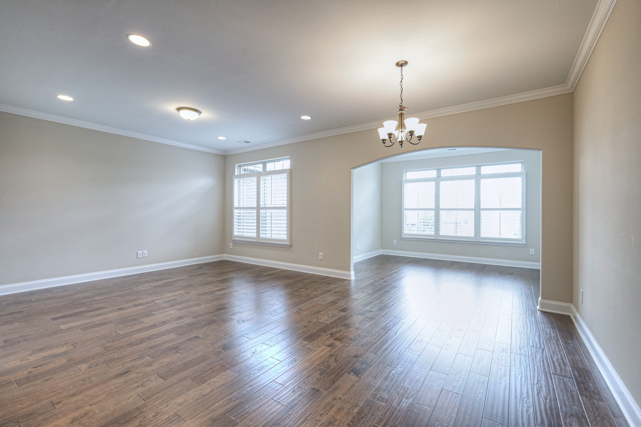 213 Vintage Way Lebanon, TN 37087 - Photo 11 of 33 a view of an empty room with wooden floor and a window