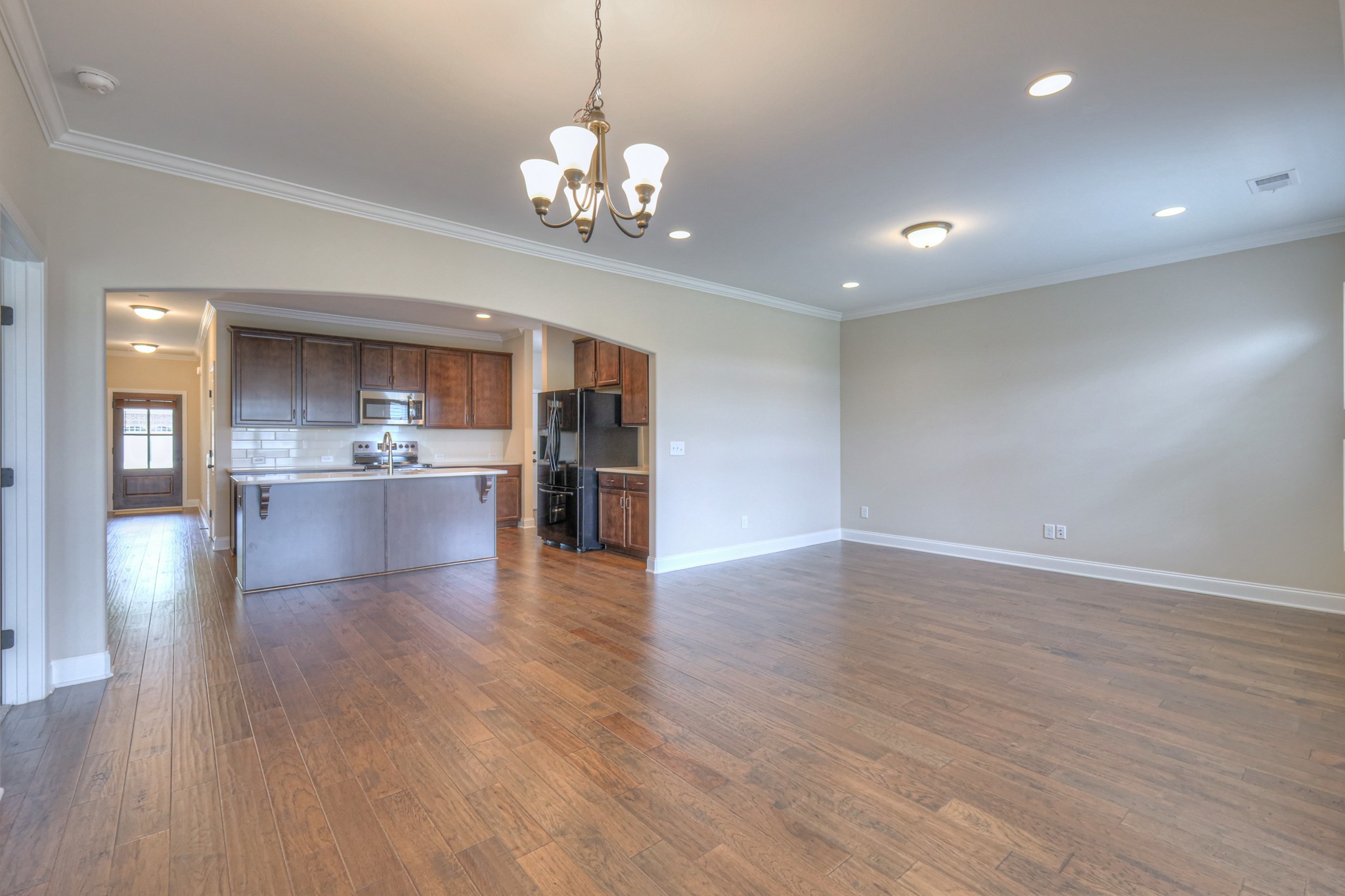 213 Vintage Way Lebanon, TN 37087 - Photo 12 of 33 a view of a kitchen with a sink and wooden floor