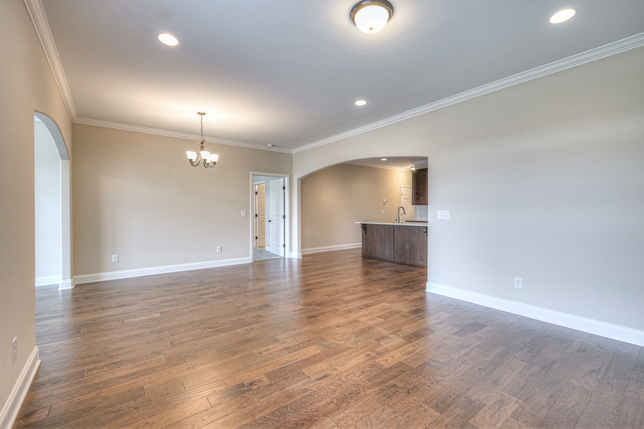 213 Vintage Way Lebanon, TN 37087 - Photo 14 of 33 an empty room with wooden floor cabinet and windows