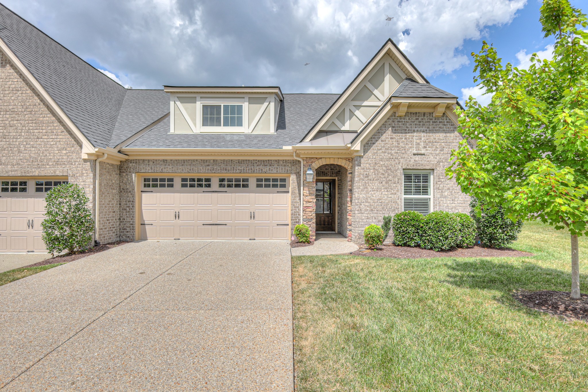 213 Vintage Way Lebanon, TN 37087 - Photo 2 of 33 a front view of a house with garden