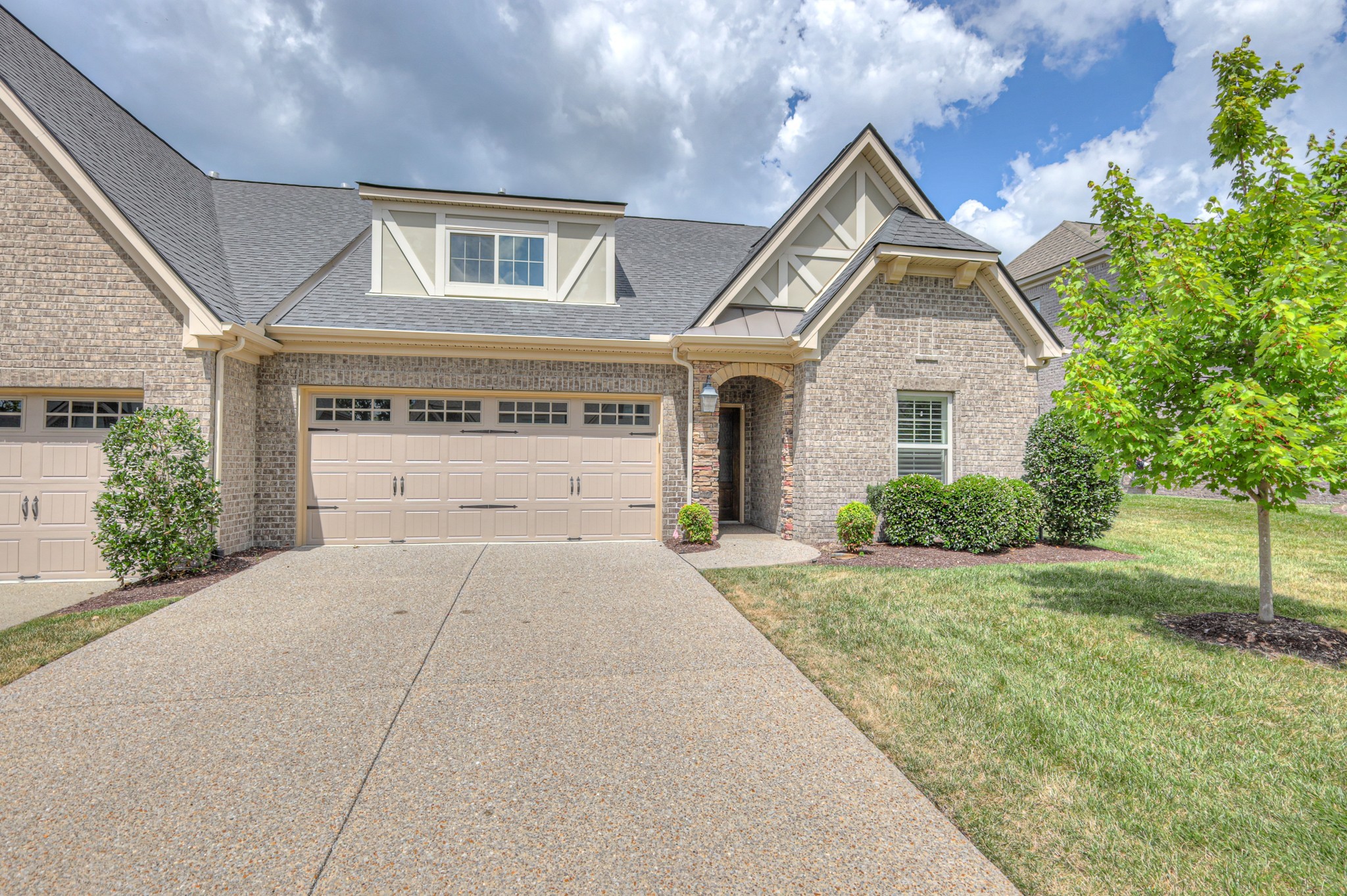213 Vintage Way Lebanon, TN 37087 - Photo 32 of 33 a front view of a house with a yard and garage