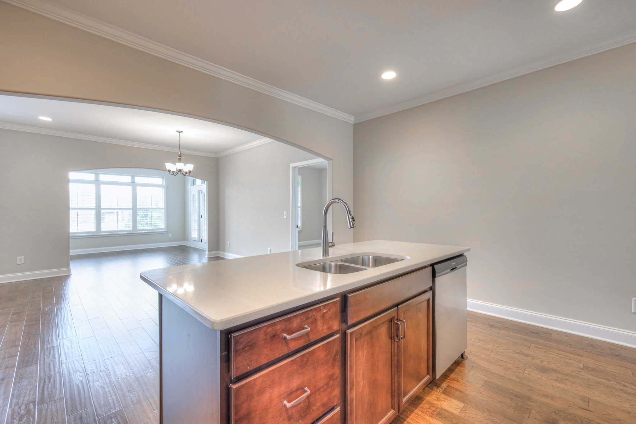 213 Vintage Way Lebanon, TN 37087 - Photo 10 of 33 a kitchen with a sink cabinets and wooden floor