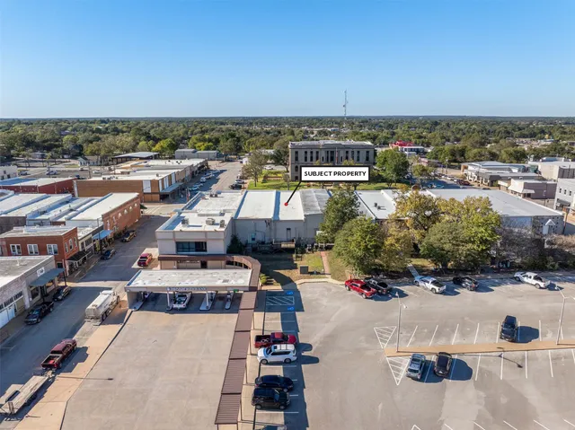 a view of multiple houses with outdoor space