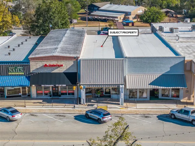 an outdoor space with furniture